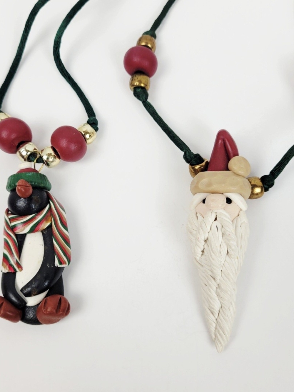 2-Vtg Christmas Polymer Clay Pendant Necklace~Old World Santa~Festive Penguin